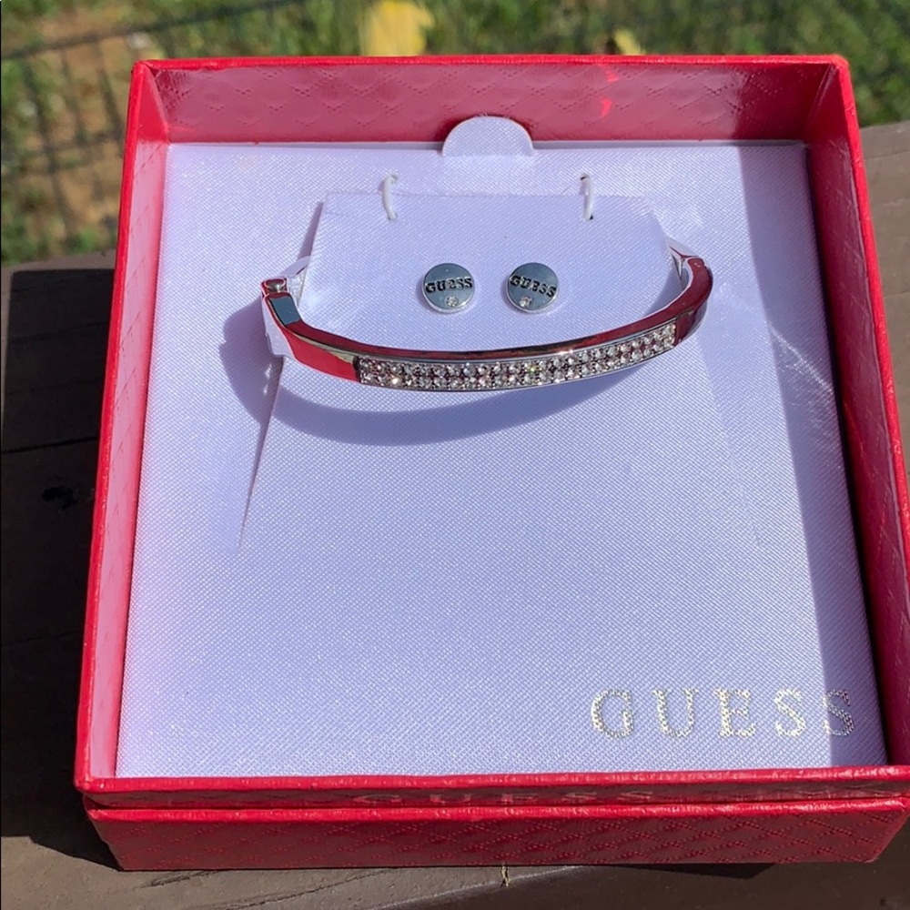 GUESS silvertone bracelet and earring set